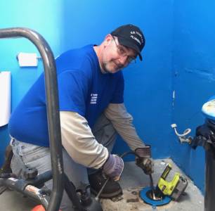 E.W. Tompkins plumber - Wll